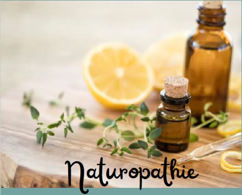 Flacons d'huiles essentielles et citron frais pour illustrer les soins de naturopathie chez Zenaturatoi.